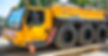 Mobile_Crane_At_Work._Construction_Site_Of_Luxury_Condominium_original_2348020.jpg
