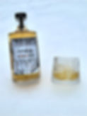Acerum maple spirit served over ice in a glass