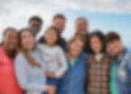 Diverse group of smiling people, symbolizing our community-first approach and accessible support for everyone.