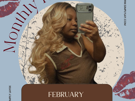 Woman taking a selfie, wearing a brown top. Text: Monthly Review, February 2025. Blue background with lipstick marks and a vintage feel.