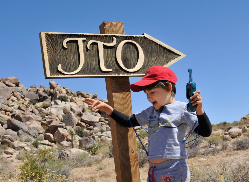 Smiles by the JTO Sign
