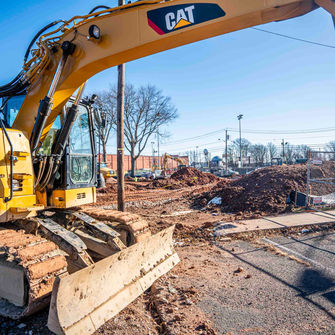 Excavator taking a break from helping prepare foundations for Rahway Housing Update