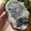 Thumbnail: Purple and Black Galaxy Amethyst cluster on raw cut base