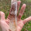 Thumbnail: Clear Quartz wand with Hematite phantom inclusions