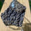 Thumbnail: Pyrite on raw Shungite layered slab-rare specimen from Brazil