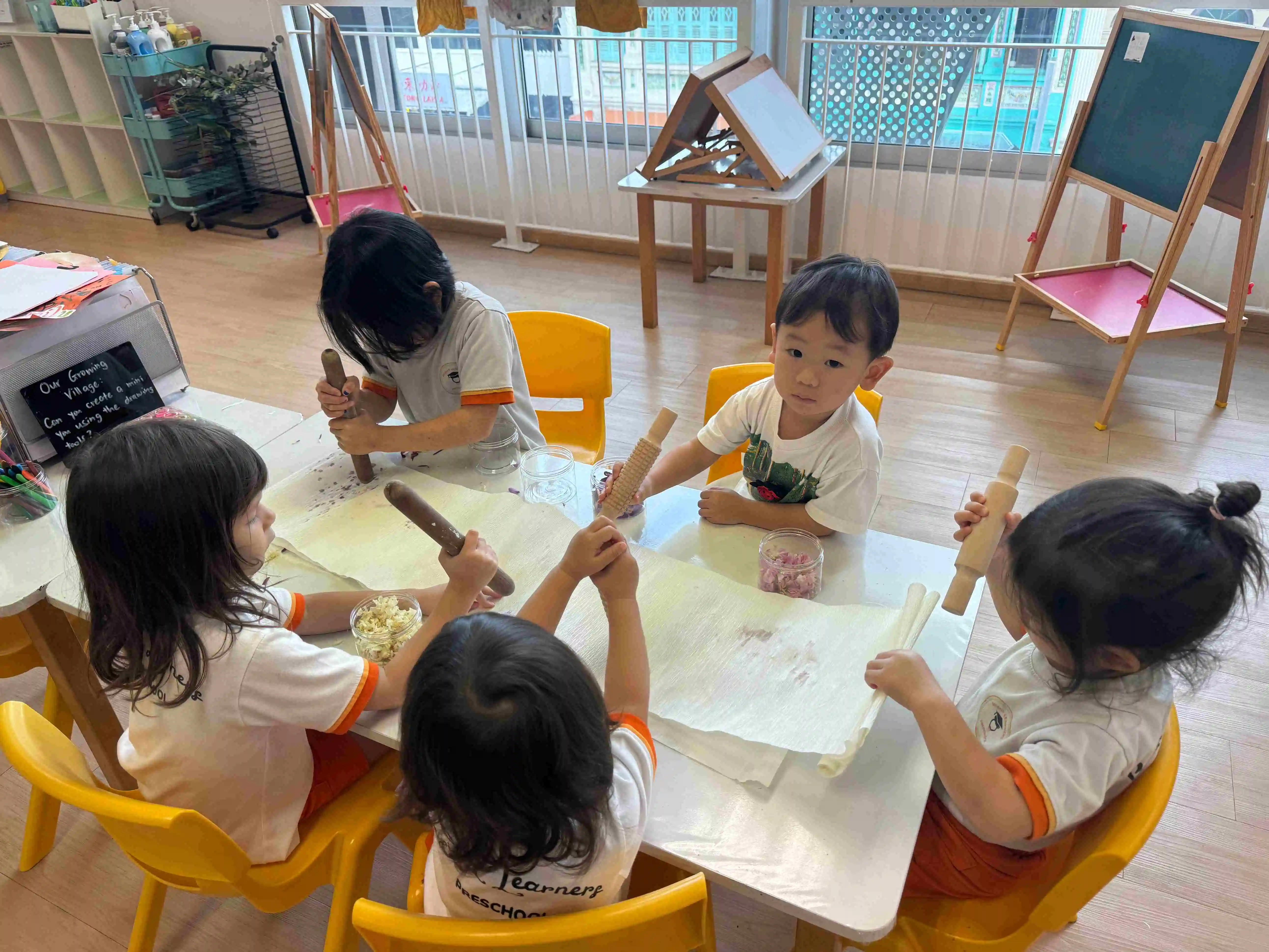 Preschool in East coast road-  kids busy in an activity