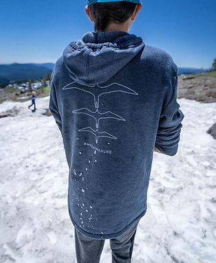 Paddler in snow with Kai Wa'a hoody