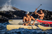 Avan Becerra and Kua Nolan paddling Kai Wa'a Ares OC1