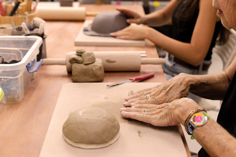 close-up-on-hands-making-ceramics.jpg