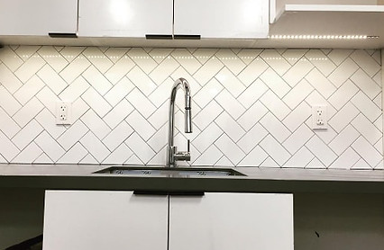 Herringbone Subway Tile Backsplash by Good Choice Contracting.