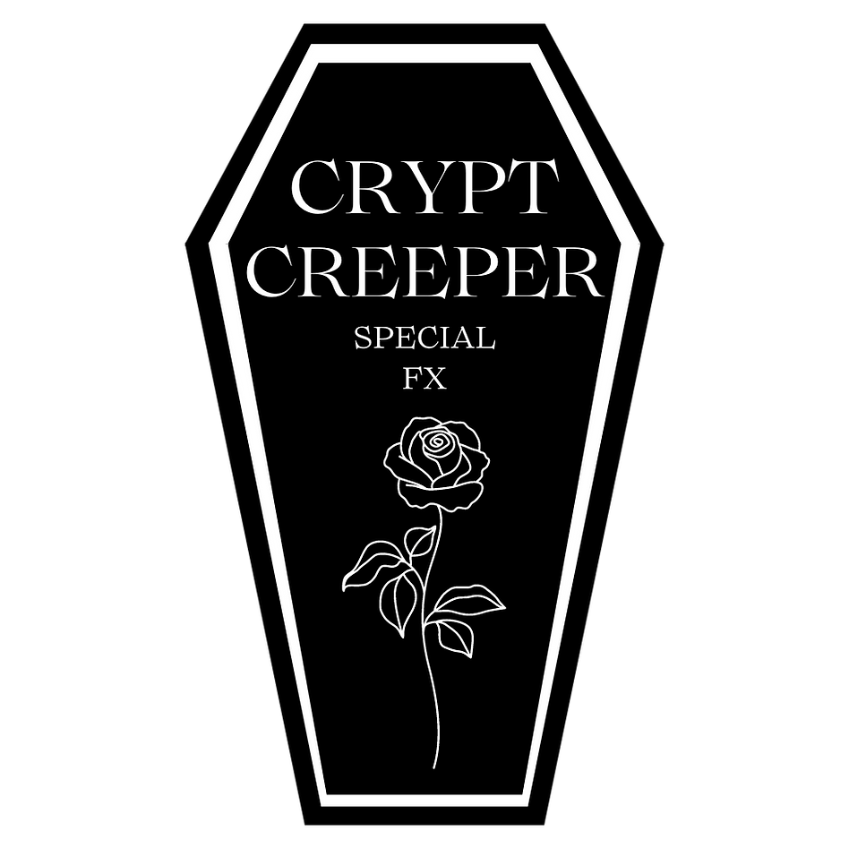 Black coffin shaoe with white outlines. White text reads "Crypt Creeper Special FX", with white line drawing of a rose.