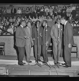 The Debonairs perform at Washington High School