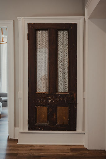 Origional cabinet door in the Barton House lobby