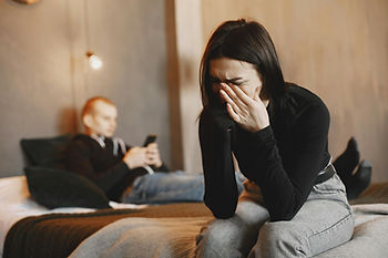 Person upset from a broken heart, representing breaking toxic relationship cycles