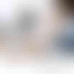 Man utilising a Fifine microphone with the appropriate shock mount configuration.