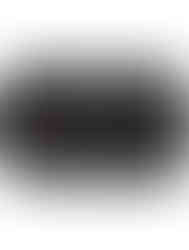 Close-up view of a Yamaha guitar pickup and tuner control panel, displaying volume, tone knobs, and tuner with a digital disp