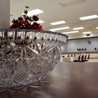 An elegantly arranged dinner setup in the large room of Westlock Memorial Hall. 