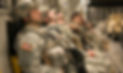 Sleeping military personnel in full gear