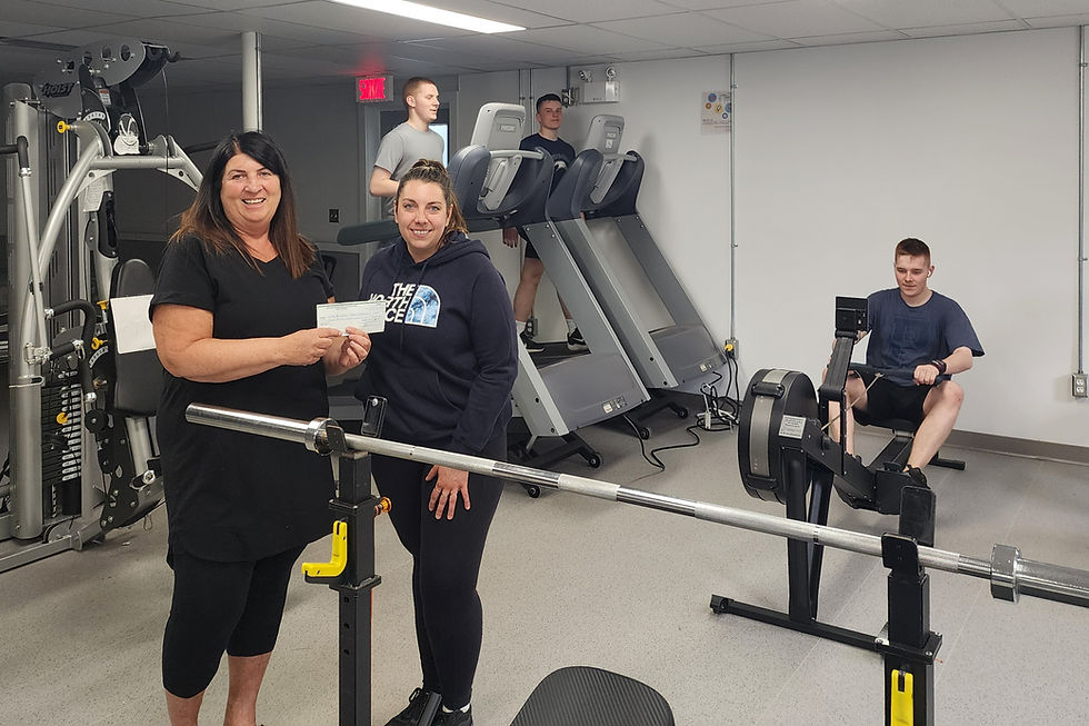 Photo : (In front) Ms. Carmelle Mathurin, President of the Recreation Committee, Ms. Julie Bernard, Director of the Foundation (behind) Mr. Zachary Bernatchez, Mr. Dylan Curadeau Henley & Mr. Frederic Curadeau Henley, clients