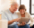 Happy Seniors Looking at iPad, tablet, baby boomers, smiling, technology, home