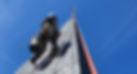Cordiste campaniste sur un clocher après son escalade