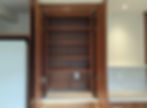 An empty pantry in Seattle, WA.; the first step of a home organizing project.