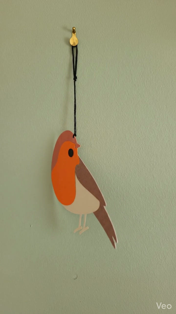 Miniature : Détail de l’oiseau découpé à la main