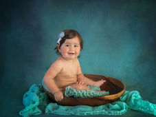 Baby Milestone Sitter Stage Photography for Crestview family baby girl sitting in a wooden bowl