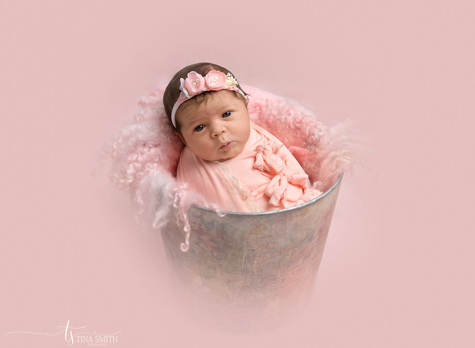 niceville newborn photographer baby blowing kisses