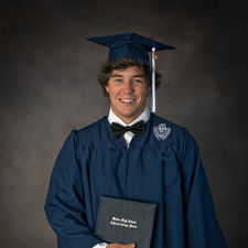 Senior graduation portrait session with traditional cap and gown