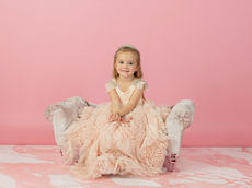paxton fl childrens studio photography little girl in peach dress sitting on a princess couch