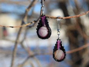 Purple Beaded Earrings hanging from a Snowy Tree branch
