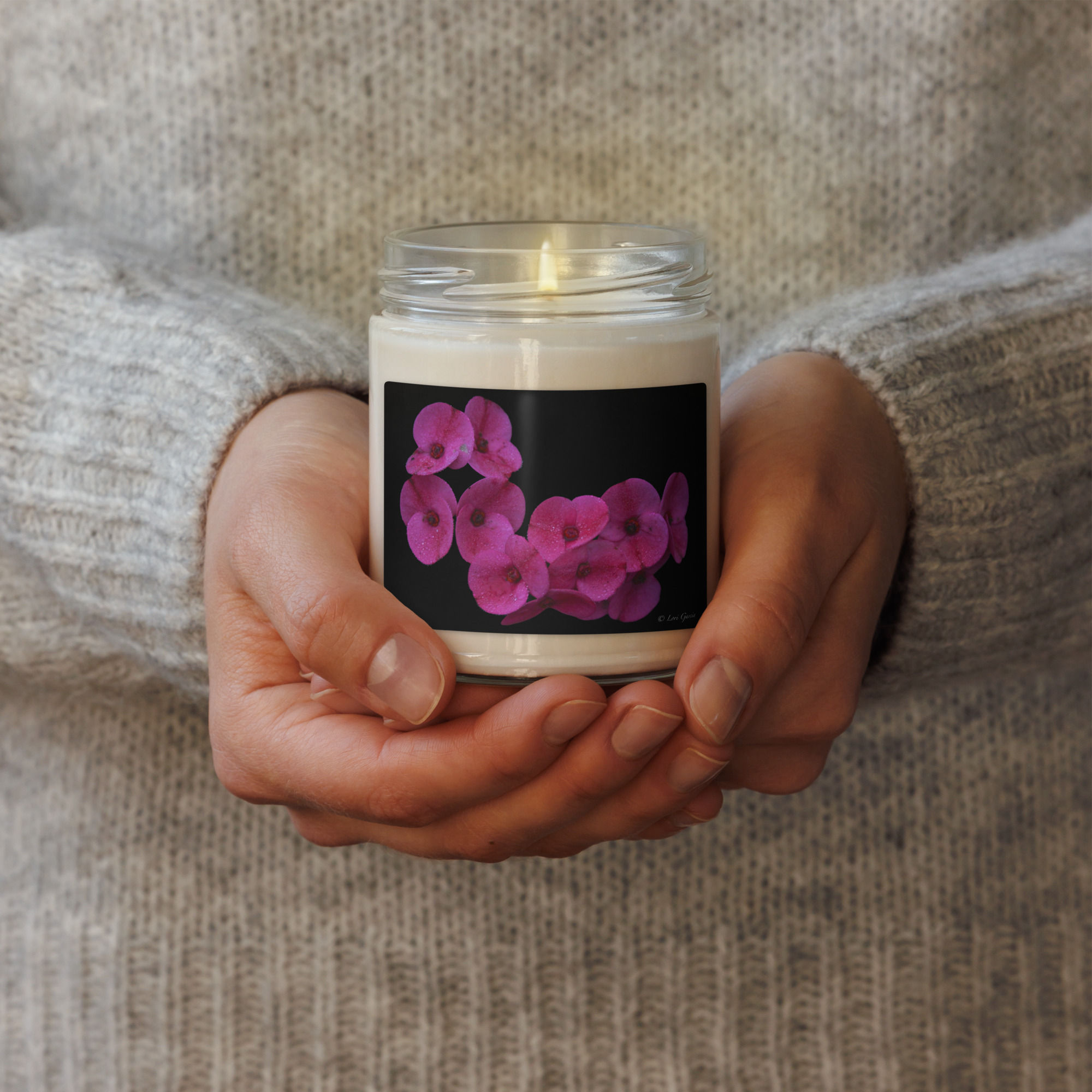 Scented soy candle Magenta flower with blacked out background