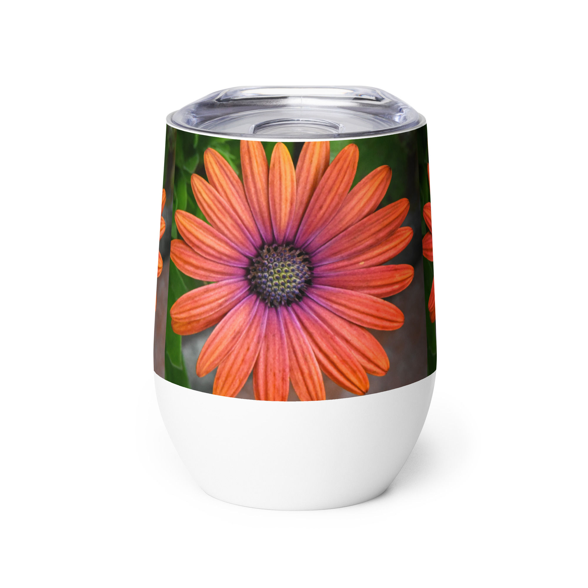 Wine tumbler with an orange flower