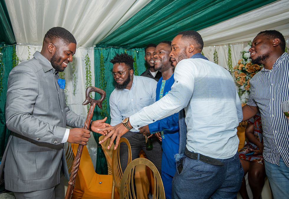 A photo of a groom and his groomsmen at a traditional Congolese wedding we shot in Kampala, Uganda.