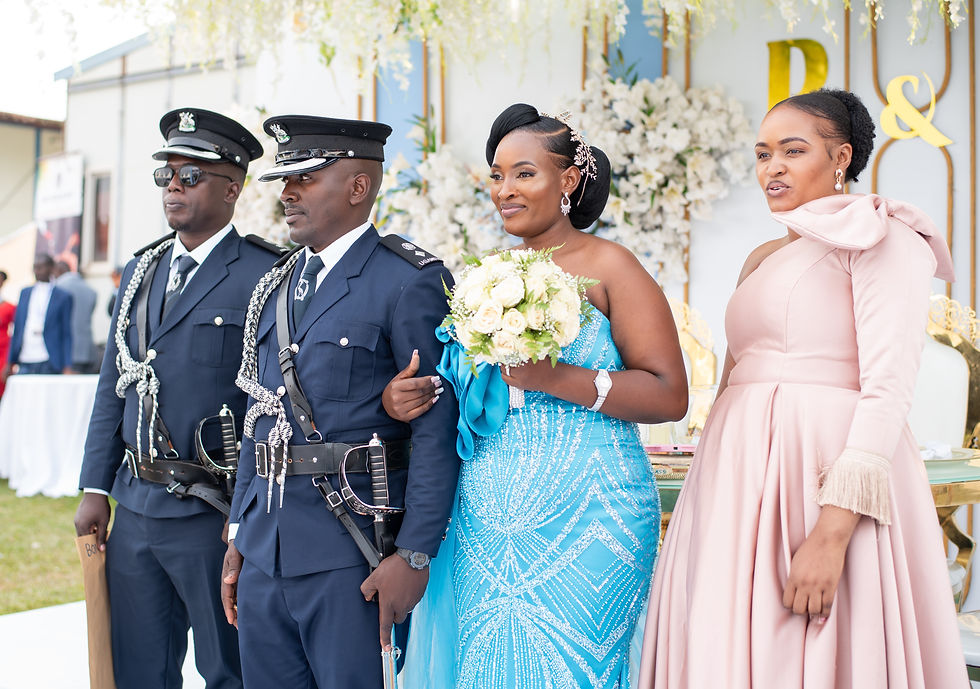 A photo from one of our wedding albums crafted for a Superintendent of Police and his lucky bride in Kampala, Uganda.