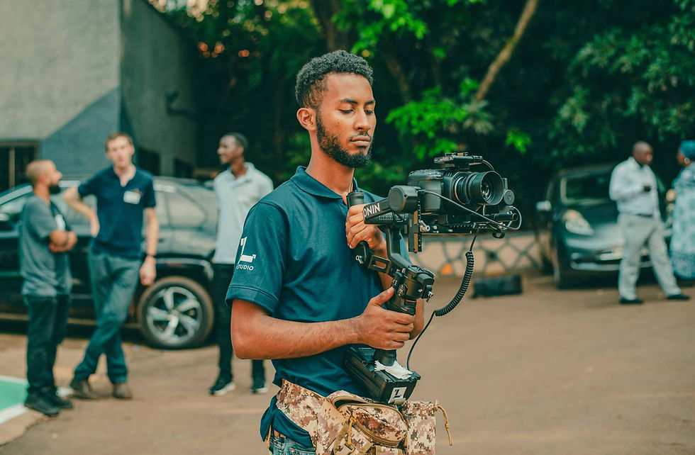 Sajo from the TLP Team filming a Corporate Video for a restaurant in Kampala.