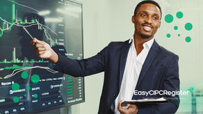 Understanding Beneficial Ownership at CIPC. Company register services from EasyCIPCRegister: An image featuring a smiling man in a dark suit and white shirt, holding a tablet and pointing with a pen at a large screen displaying financial charts and trading data, including BTC and APP values. The background is a modern office with a light green wall, decorated with green circular design elements. The "EasyCIPCRegister" logo with the tagline "business registration made easy" is displayed on the right side.