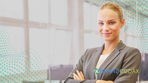 A confident professional woman in a suit, working in a modern office with glass windows and corporate branding, smiling as a business executive, with a guide on "7 Steps to Build an Effective SEO Budget in 2025