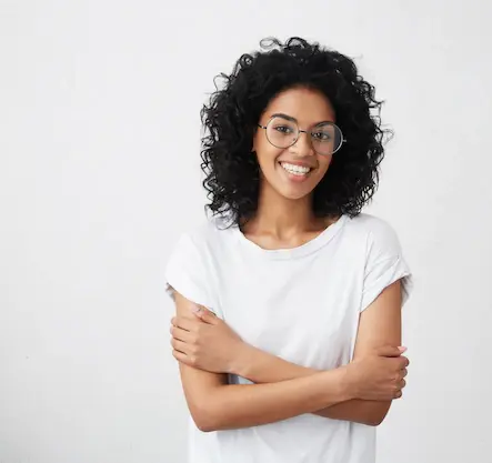 indoor-shot-beautiful-happy-african-american-woman-smiling-cheerfully-keeping-her-arms-fol