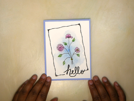 Hands Holding a Watercolor Ink Card