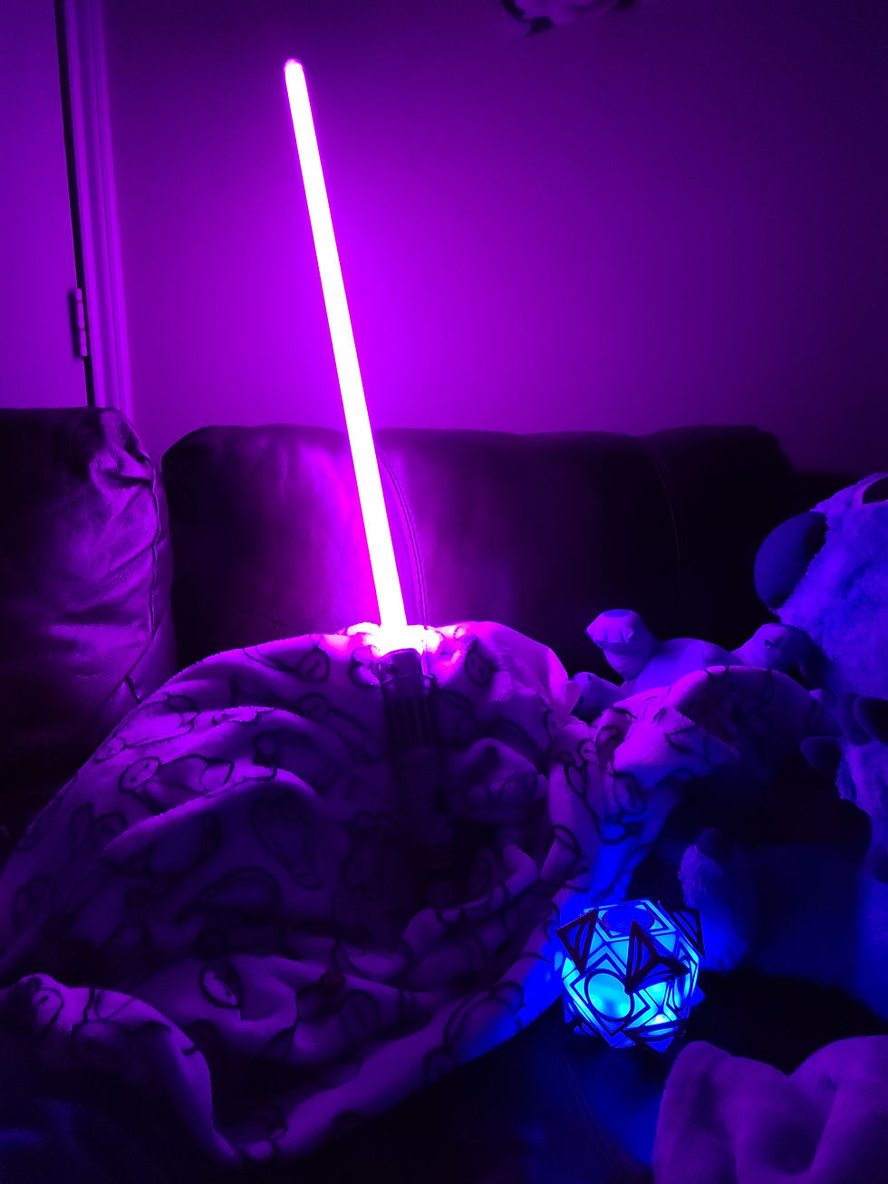 Lit Light Saber and Holocron Cube