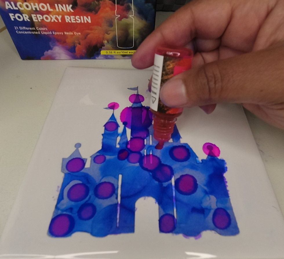 Dropping Pink Alcohol Ink On Engraved Tile