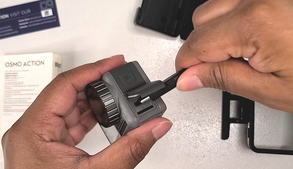 Opened Port Cover and USB-C Charging Cable