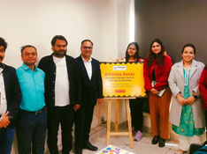 A group photograph taken at the Japan Foundation, New Delhi. Mr. Jitender Mehta, President of Experience Japan, stands centrally with seven Japanese language educators representing various schools from Delhi and NCR. The group is posed professionally in a well-lit workshop setting, celebrating the conclusion of the Nihongo Rocks Teachers' Meeting cum Workshop.