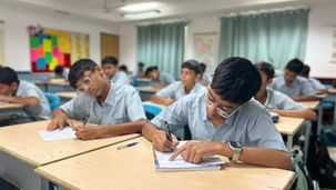 Kizuna Katha 2026 - National Painting Competition- Participants of Birla Public School Kishangarh writing their essays on assigned topic.