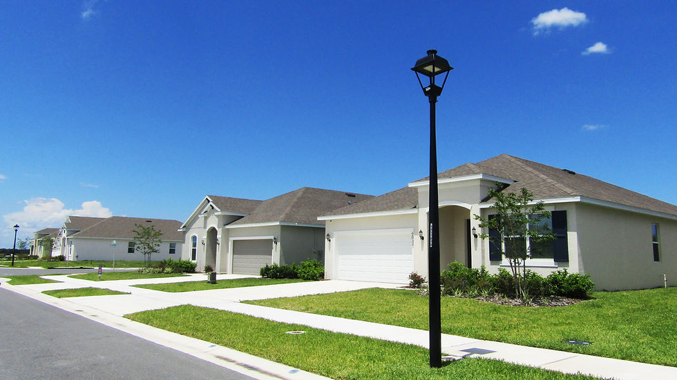 Eye-level view of a home inspector examining a residential roof in Summerfield Florida