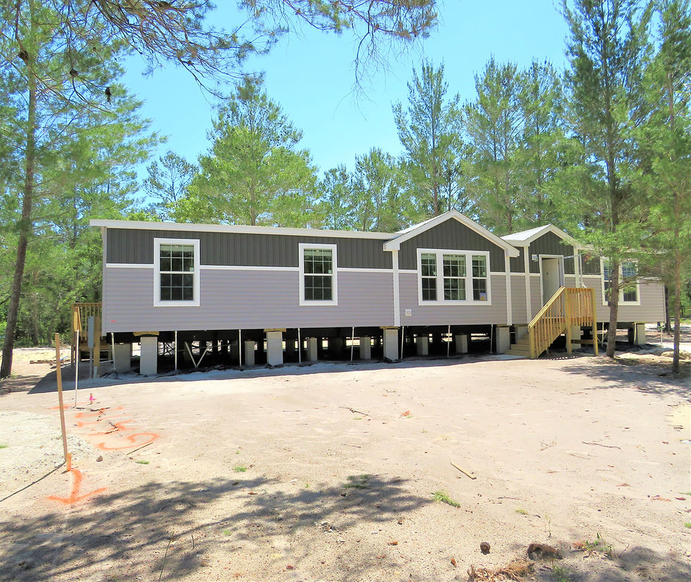 Eye-level view of a home inspector examining a residential roof