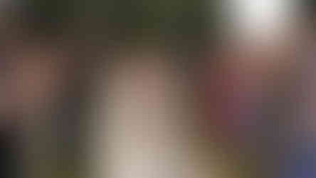 bride and groom confetti kiss at Highley Manor West Sussex. Captured during filming a wedding video at Highley Manor, West Sussex