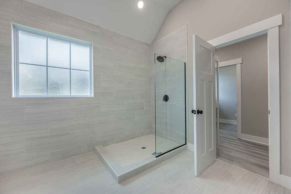 Wide angle view of modern kitchen with island and pendant lighting